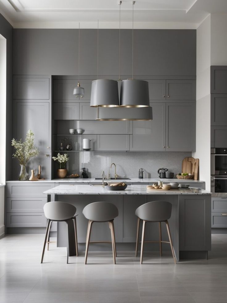 Modern kitchen with gray cabinets, island, and stools ( USA Cabinets Outlet )