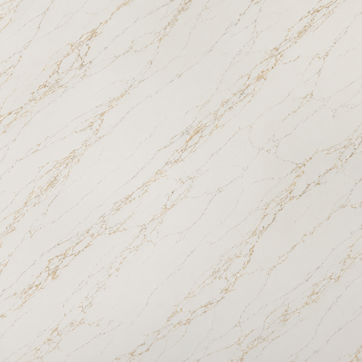 A close-up of a light beige or off-white marble-like surface with delicate warm gold veining running diagonally across the frame.| USA Cabinets Outlet 
