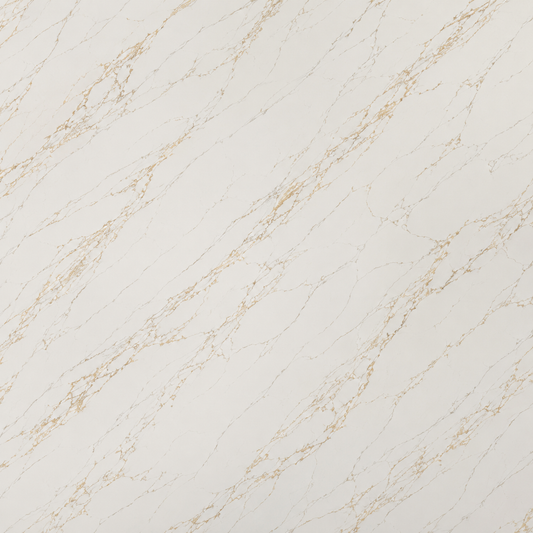A close-up of a light beige or off-white marble-like surface with delicate warm gold veining running diagonally across the frame.| USA Cabinets Outlet 