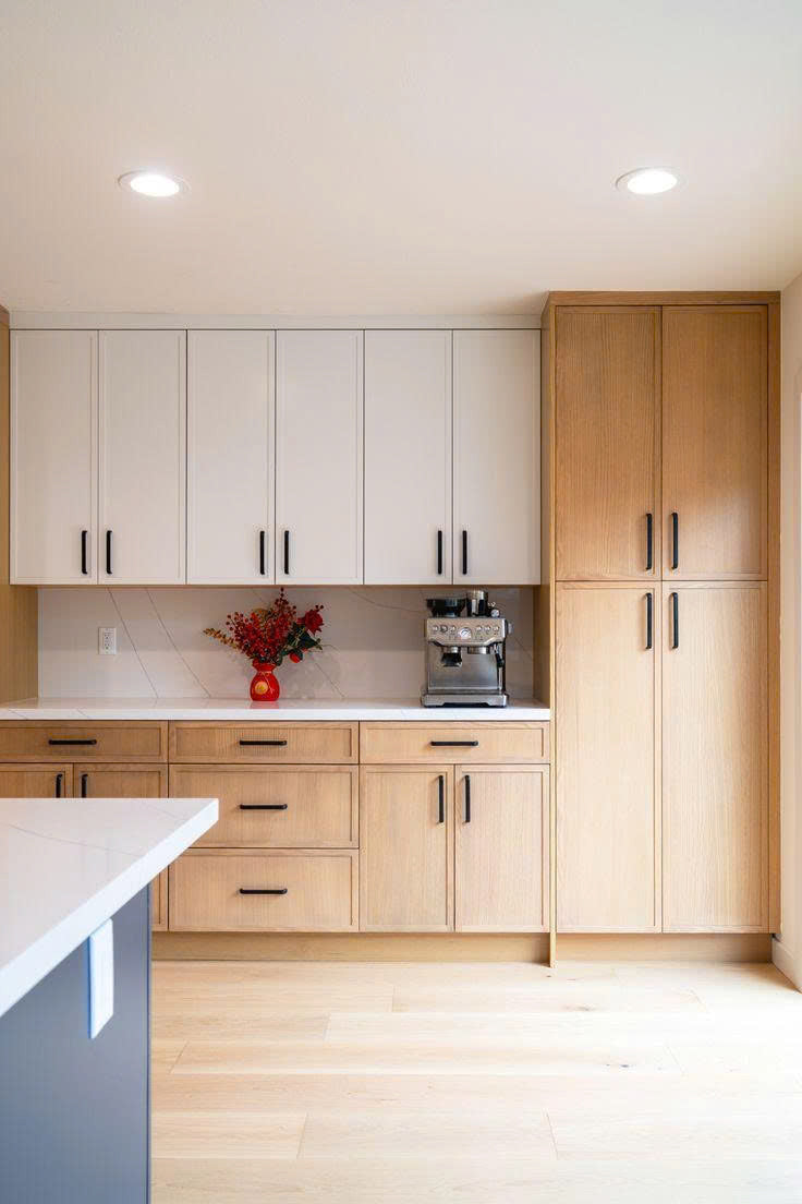 Modern kitchen with natural oak cabinets at USA Cabinets Outlet.