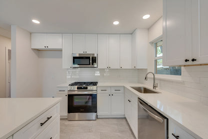 Modern_kitchen_with_shaker_white_tray_cabinets at USA Cabinets Outlet