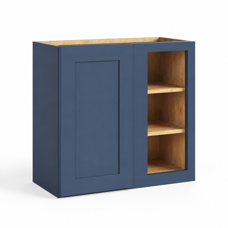 A navy blue wall cabinet with one paneled door and one open shelving section, showing natural wood interior shelves and top, on a white background.| USA Cabinet Outlet |