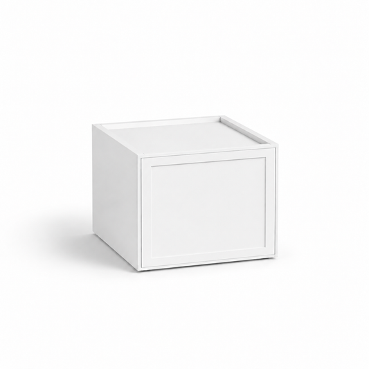 A minimalist white cube storage box with a recessed front panel and a hinged lid, shown on a seamless white background at USA Cabinets Outlet