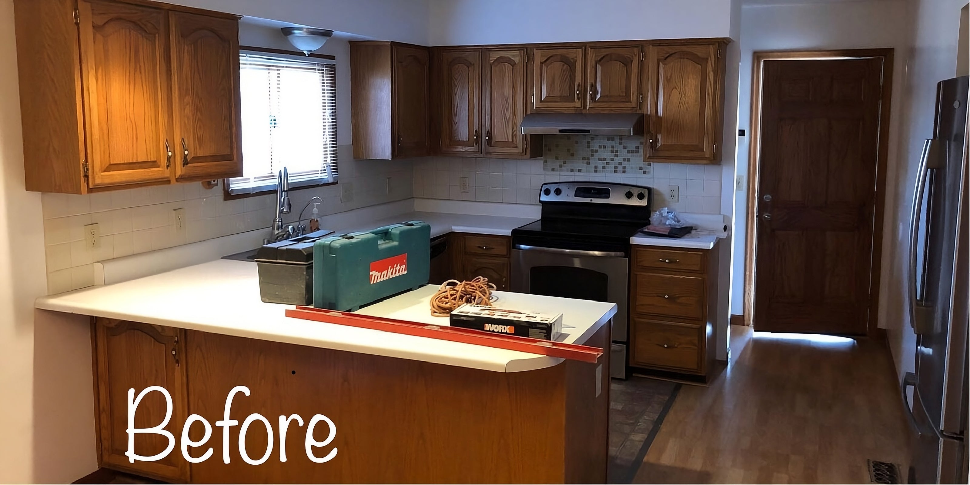 Kitchen with wooden cabinets and appliances, labeled 'Before' ( USA Cabinets Outlet )